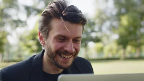 Closeup video of cheerful optimistic businessman handsome entrepreneur Stock Footage 251377553