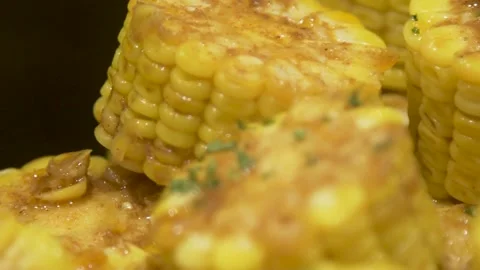 Closeup Video of Cooked Corn in Black Background Stock Footage 217667431