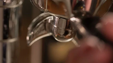 Closeup video of extraction process from espresso machine, made from raw Stock Footage 39934629