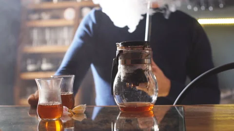 Closeup video glasses with tea are on a table. Stock Footage 100230100