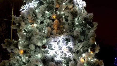 Closeup video of glowing and blinking colorful led lights on Christmas tree Stock Footage 123008444