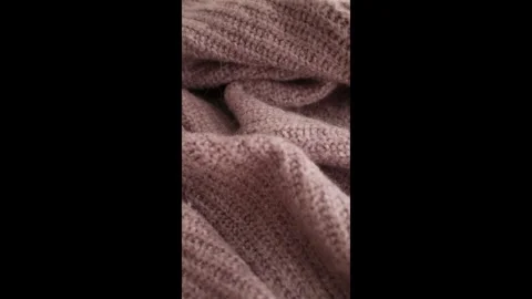Closeup video of hands touching soft knitted fabric Video stock 317094255