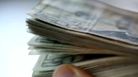 Closeup video of man hands counting american dollars banknotes on white bac.. Stock Footage 266476261