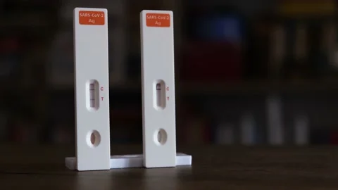 Closeup video with positive and negative coronavirus tests inside a home Stock-Footage 172067582