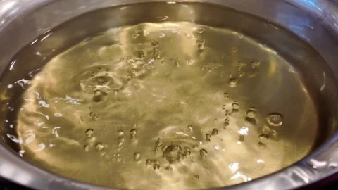 Closeup video still of boiling water in pot Stock Footage 325650249