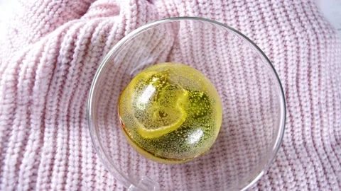 Closeup video of tea ball bomb Stock Footage 167763013