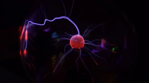 Closeup view 4k video of magic plasma ball glowing in darkness. Stock Footage 125513097