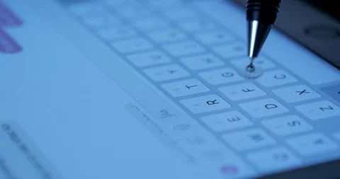 Closeup view adult using virtual keyboard on tablet device to send message on Stock Footage 95626848