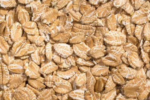 Closeup view and pattern of some spelt flakes Stock Photos