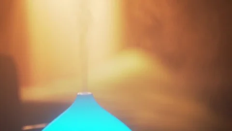 Closeup View Of An Aroma Oil Diffuser On The Table Inside A Room, Steam Stock Footage 127608360