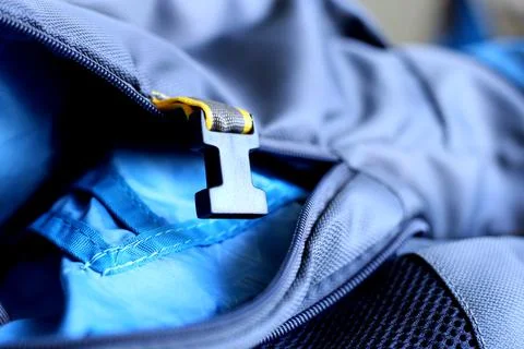 Closeup view of backpack, Grey and yellow Travel bag backside view Stock Photos