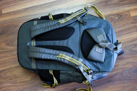 Closeup view of backpack, Grey and yellow Travel bag backside view Stock Photos