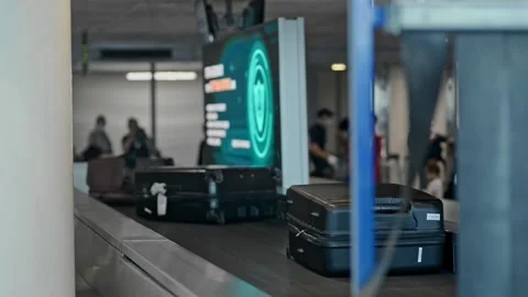 Closeup view of baggage moving on belt and people walking at airport interior. Vídeos de archivo 158384108