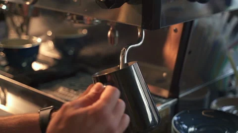 Closeup view of barista preparing drink and working with equipment in cafe Stock Footage 157820958