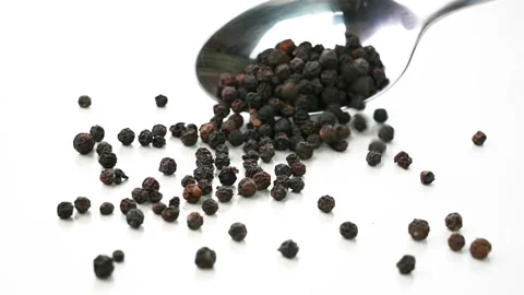 Closeup view of black peppercorns Stock Footage 228197110