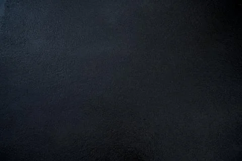 Closeup view of the black wall. Abstract pattern of a concrete wall Stock Photos