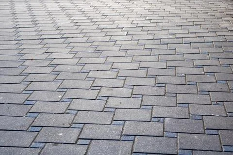 A closeup view of a brick pavement with a diagonal pattern 스톡 사진