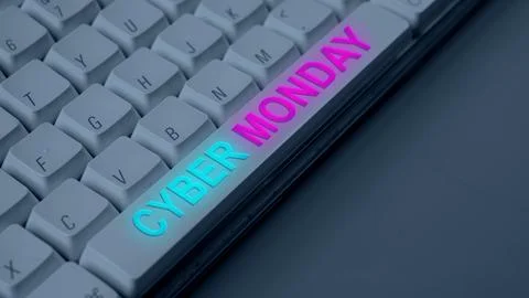 Closeup view of bright lit text of Cyber Monday on the computer keyboard bu.. Stock Photos