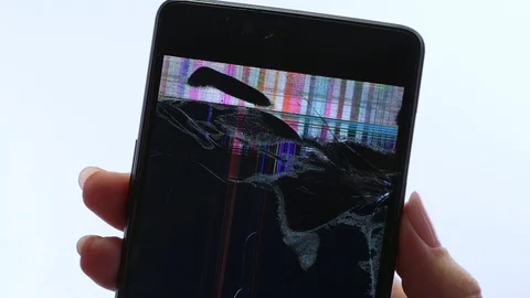 Closeup view of broken screen of black smartphone in hands of woman. Stock Footage 85908609