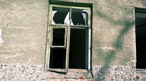Closeup view broken windows of destroyed house Stock Footage 68812935
