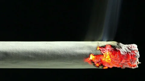 Closeup view of burning cigarette Stock Footage 35575625
