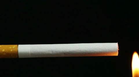 Closeup view of burning cigarette in time-lapse Stock Footage 35575810