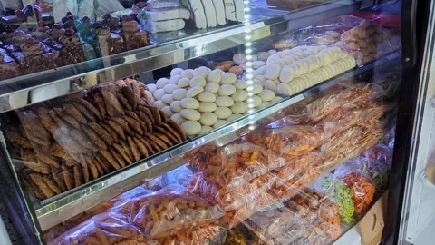 Closeup view of busy bakery showcasing fresh baked goods and inviting interio Stock-Footage 346817412