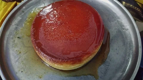 Closeup view of caramel flan dessert showing smooth texture and glossy cara.. Stock Footage 337037857