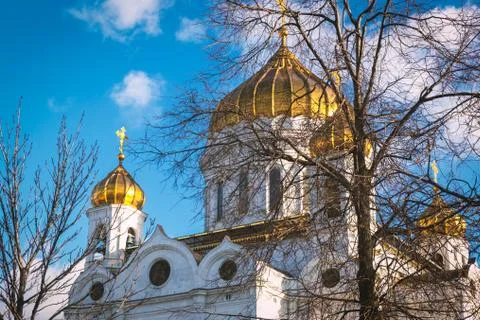 Closeup view of Cathedral of Christ the Saviour facade in Moscow with blue sk Stock Photos