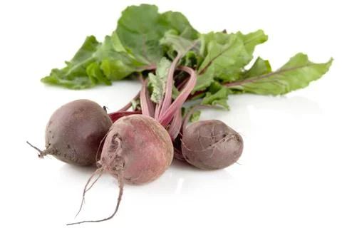 Closeup view of chard with three beetroots isolated on white background Stock Photos