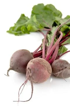Closeup view of chard with three beetroots isolated on white background Stock Photos