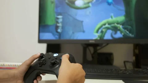 Closeup view of child boy hands playing game on console,videogame addiction Stock Footage 139329583