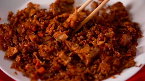 Closeup view on chinese food, someboady eating with chinese chopsticks Stock Footage 158770386