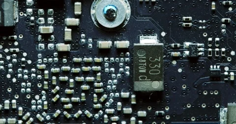 CloseUp View of Circuit Board that Features Various Microchips and Components 動画素材 294233908