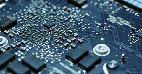 CloseUp View of Circuit Board that Features Various Microchips and Components Видео 294233983