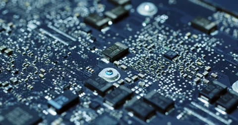 CloseUp View of Circuit Board that Features Various Microchips and Components Stock Footage 294234087
