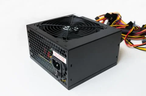 Closeup view on computer power supply on white background. Stock Photos