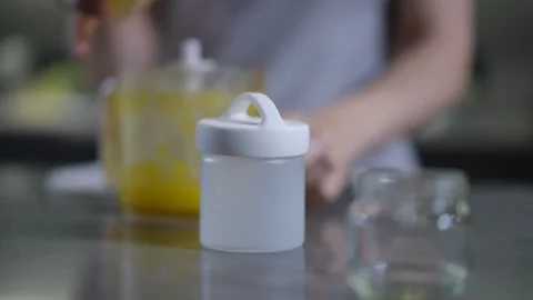 A closeup view of a container positioned in kitchen setting for aesthetic appeal Stock Footage 301437532