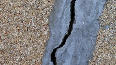 Closeup view. Cracked concrete wall texture at the outside cement Stock Footage 297050257
