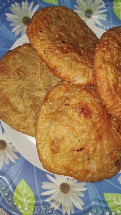 Closeup view of crispy fried traditional snack served on plate with texture Stock Footage 339080909