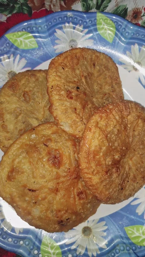 Closeup view of crispy fried traditional snack served on plate with texture Stock Footage 339080935