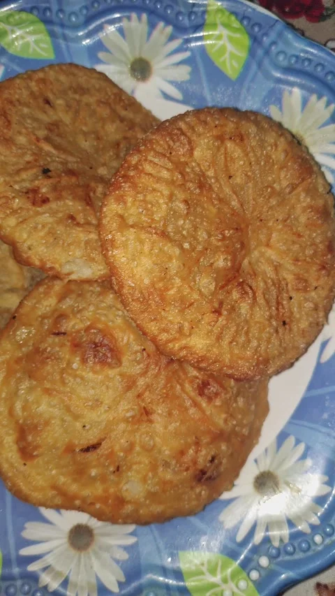 Closeup view of crispy fried traditional snack served on plate with texture Stock Footage 339080942