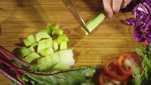 Closeup view of cut celery Stock Footage 80132277