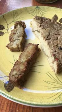 Closeup view of delicious two seared juicy cut slices of homemade seitan served  Stock Photos