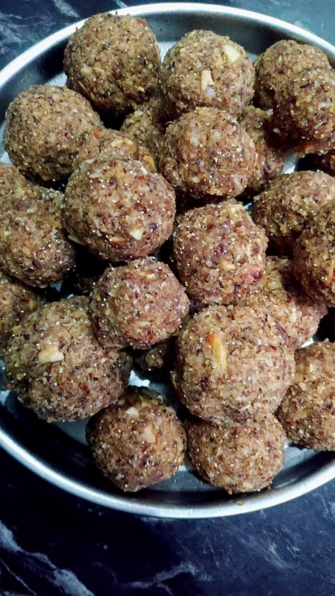 Closeup view of dry fruit laddus showing rich texture and traditional sweet.. Stock Footage 339080623