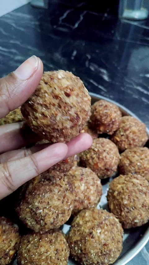 Closeup view of dry fruit laddus showing rich texture and traditional sweet.. Stock Footage 339080720