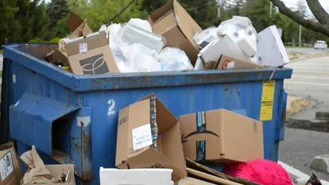 Closeup View of a Dumpster with Trash Stock-Footage 130156136