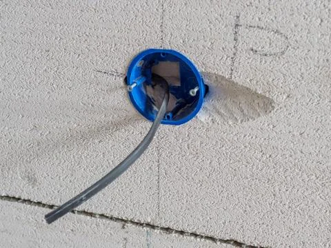 Closeup view of electrical installation socket hole. Stock Photos