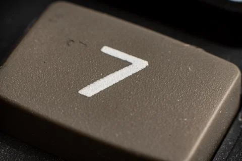 Closeup view of electronic keypad highlighting the number seven button used for Fotos Stock