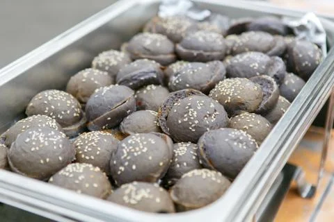 A closeup view of exotic black colored mini hamburger buns Stock Photos
